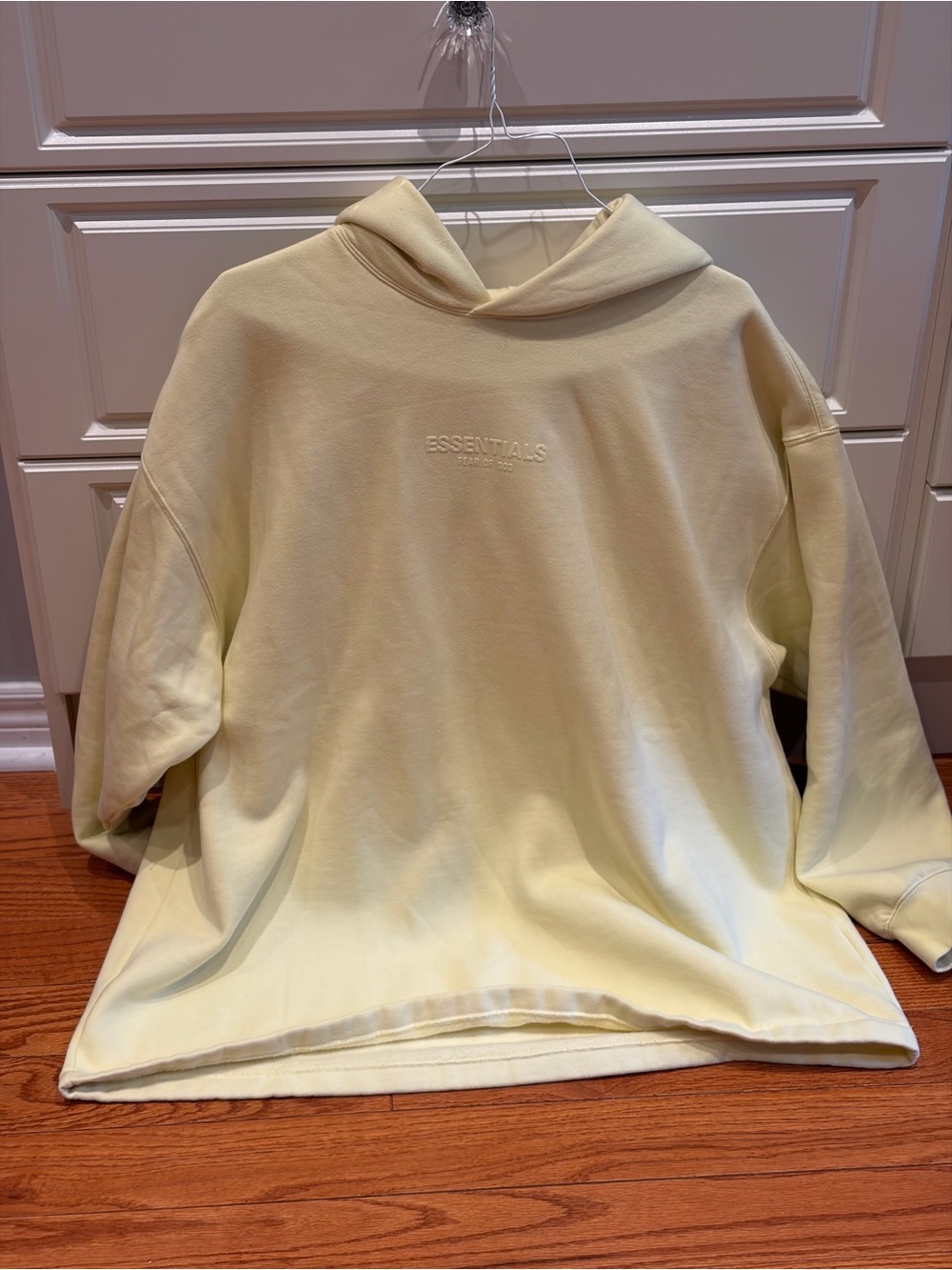 Fear of God ESSENTIALS Cream Embossed Logo Hoodie